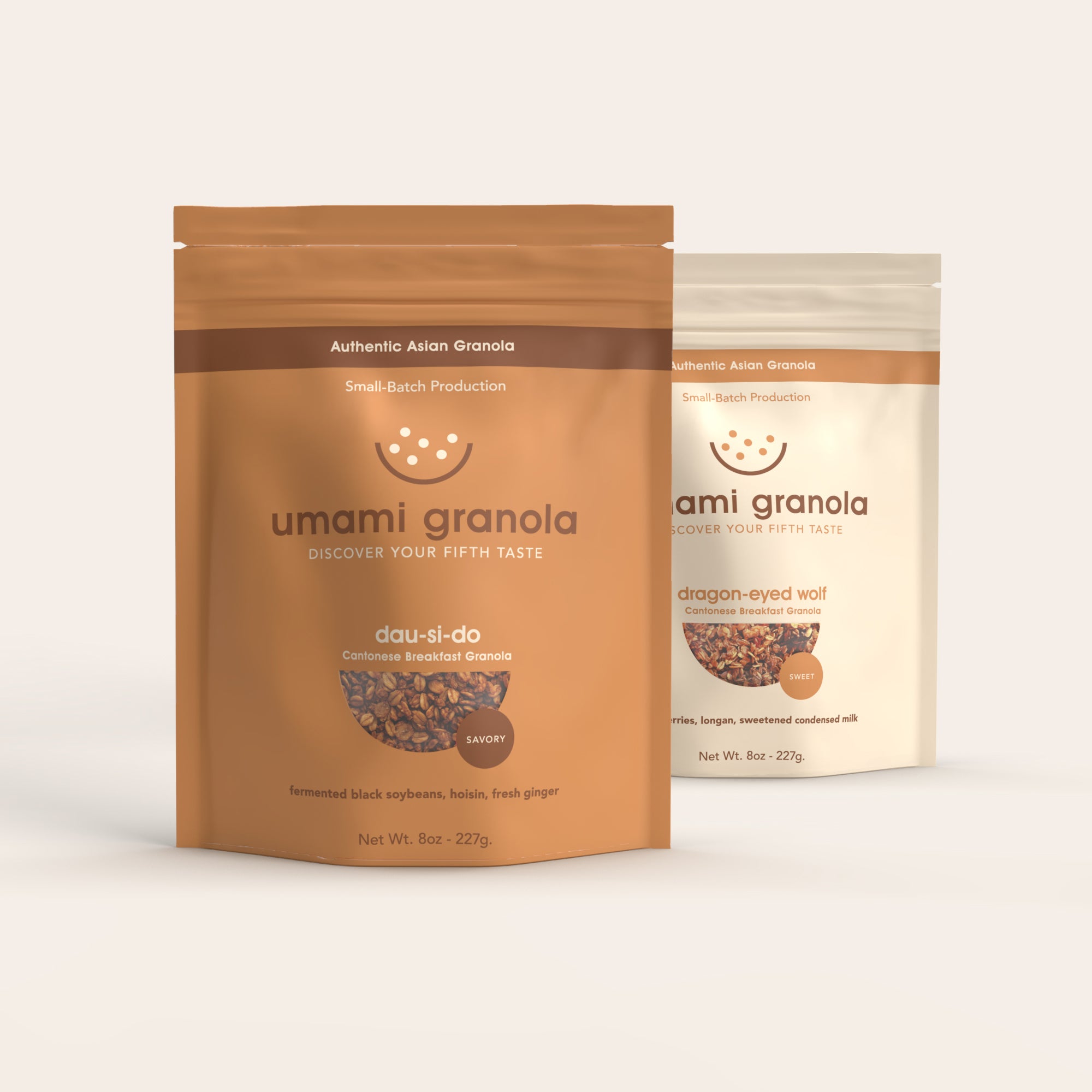 Two packages of umami granola on a white background