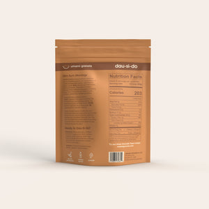 Brown package of umami granola with nutrition facts label on a white background